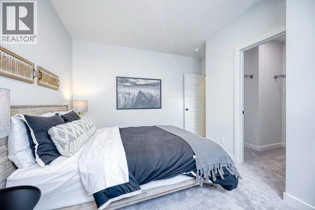 103 Wolf Creek Rise SE, Calgary, Alberta  T2X 4Z2 - Photo 40 - A2275919