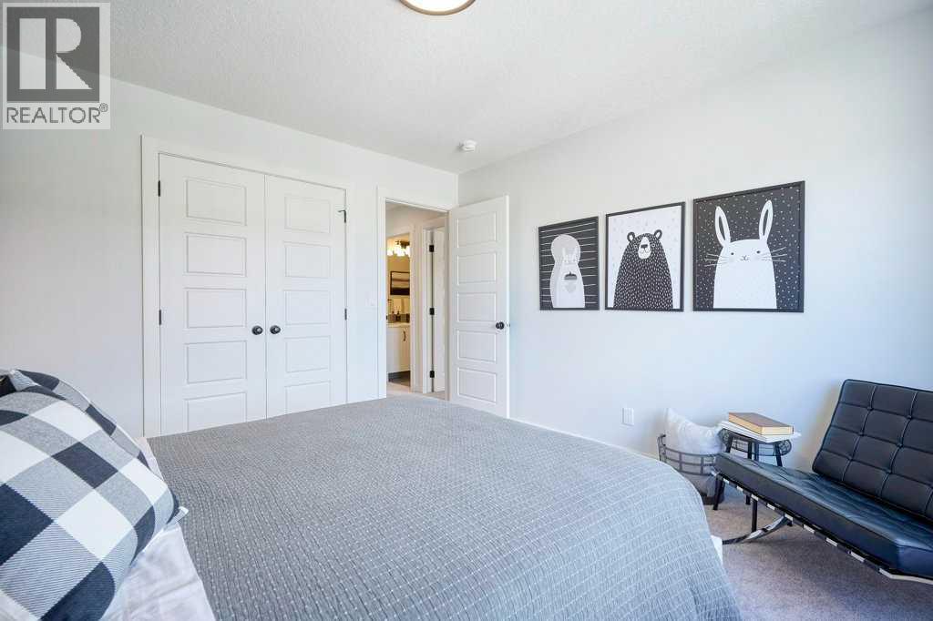 103 Wolf Creek Rise SE, Calgary, Alberta  T2X 4Z2 - Photo 33 - A2275919