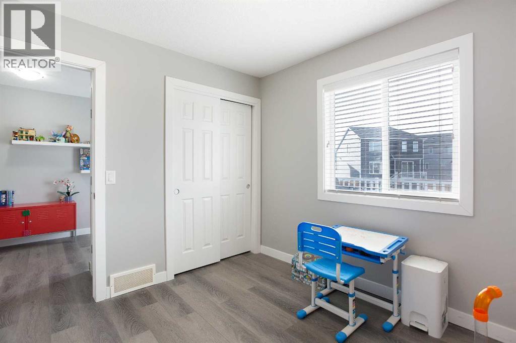4104 Windsong Boulevard SW, Airdrie, Alberta  T4B 4A2 - Photo 10 - A2289678