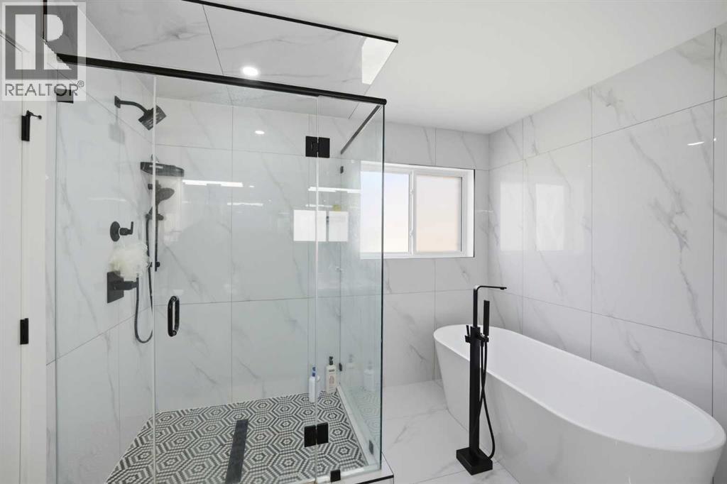 15 Saddlecrest Link NE, Calgary, Alberta  T3J 0Z3 - Photo 26 - A2307305