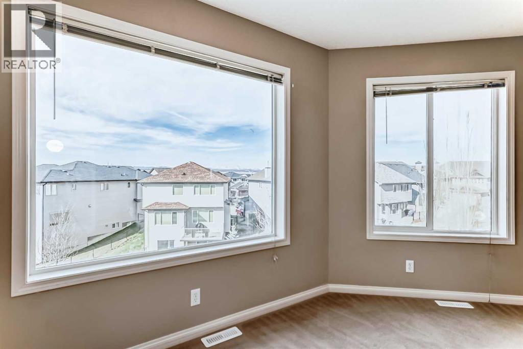 60 Sunset Circle, Cochrane, Alberta  T4C 0C3 - Photo 24 - A2307268