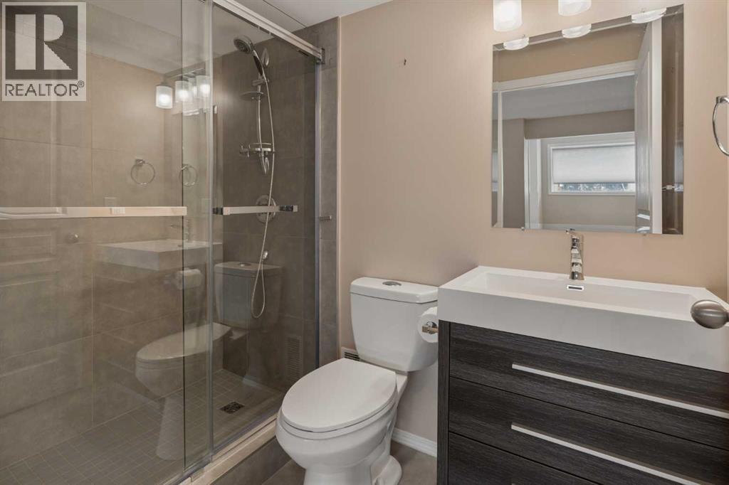 11 Valley Crest Rise NW, Calgary, Alberta  T3B 5W8 - Photo 41 - A2307013