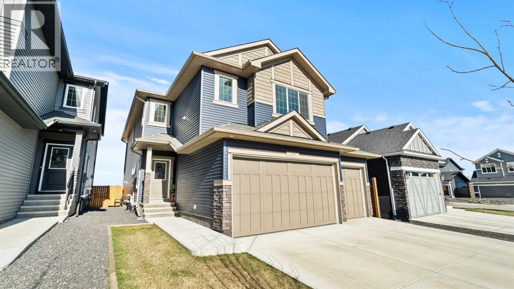 152 Threepoint Cove, Okotoks, Alberta  T1S 5S4 - Photo 3 - A2307298