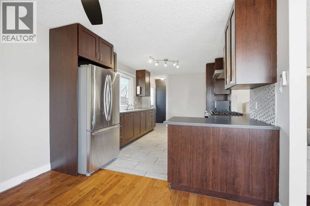 1523 110 Avenue SW, Calgary, Alberta  T2W 0E2 - Photo 12 - A2304946