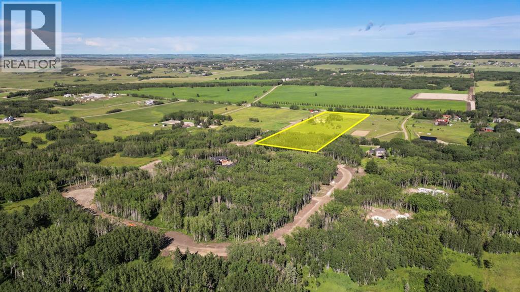 21 Elkstone Way, Rural Rocky View County, Alberta  T4C 2Y8 - Photo 4 - A2306723