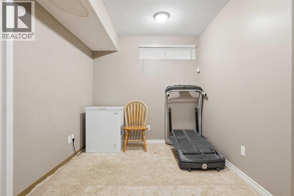 202 New Brighton Manor SE, Calgary, Alberta  T2Z 4J4 - Photo 39 - A2306864
