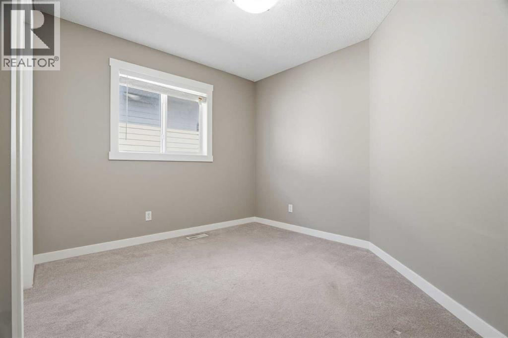 202 New Brighton Manor SE, Calgary, Alberta  T2Z 4J4 - Photo 24 - A2306864
