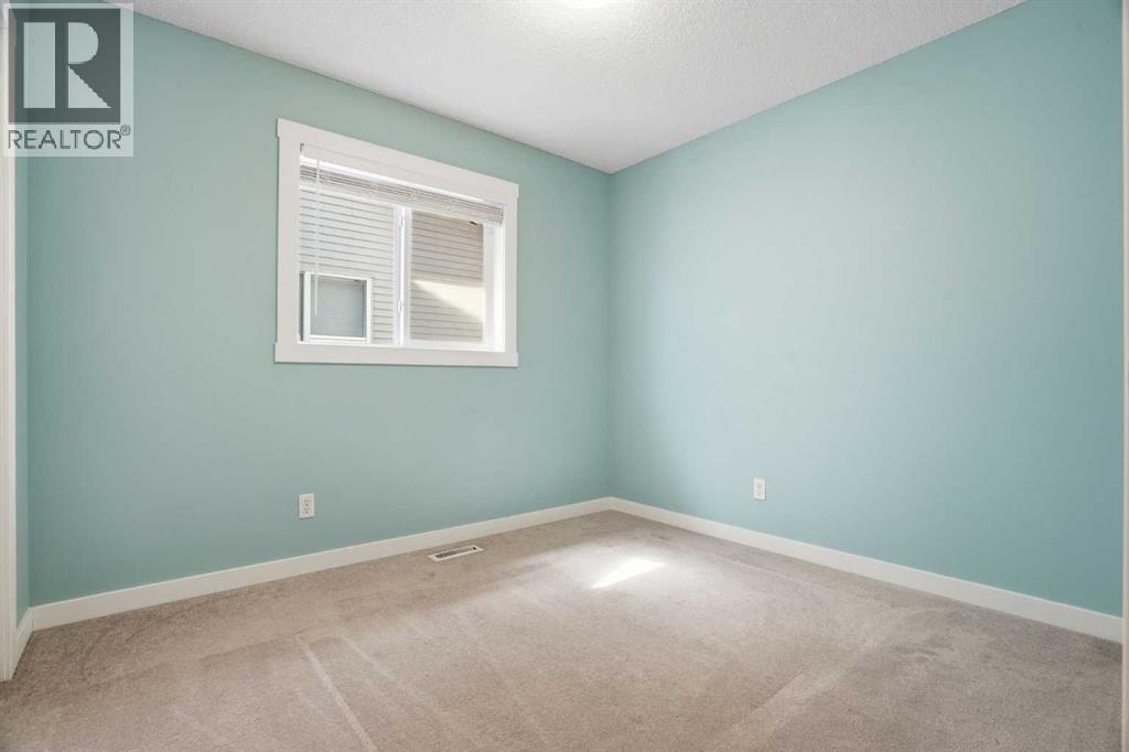 202 New Brighton Manor SE, Calgary, Alberta  T2Z 4J4 - Photo 31 - A2306864