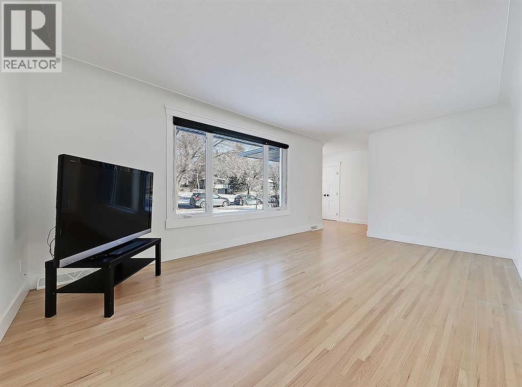 23 Cambrian Drive NW, Calgary, Alberta  T2K 1P3 - Photo 6 - A2291878