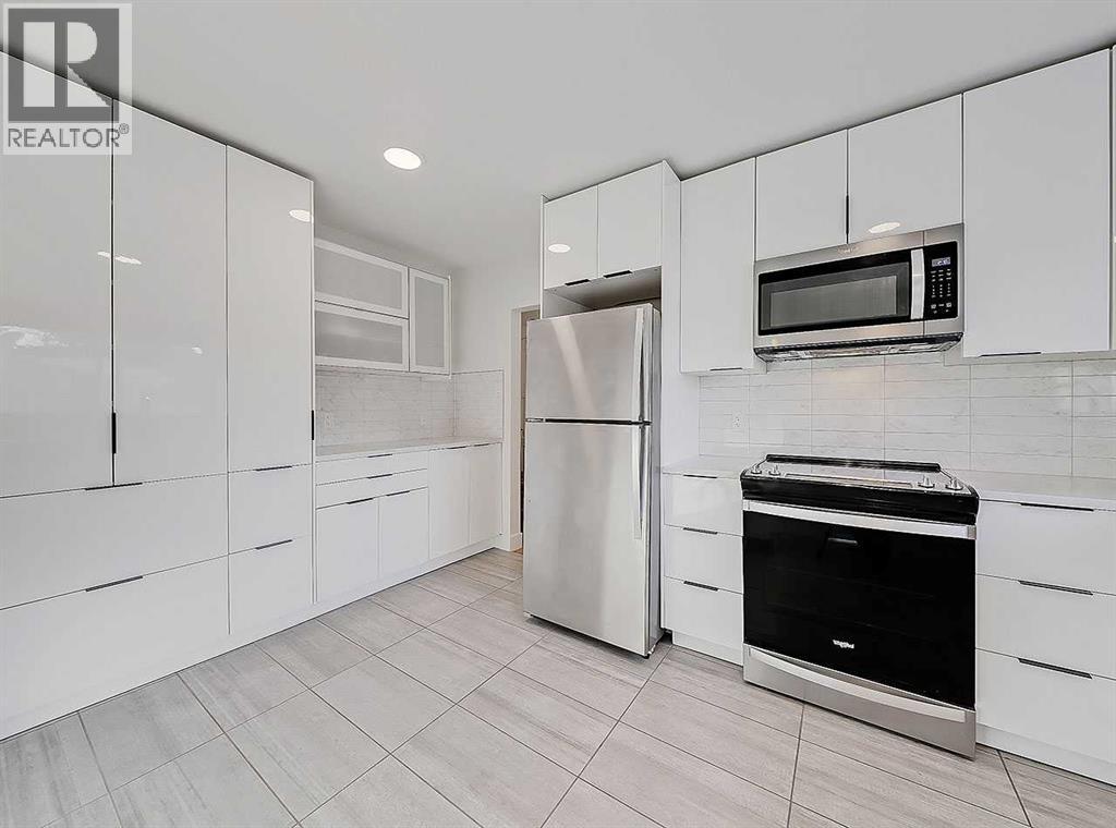 23 Cambrian Drive NW, Calgary, Alberta  T2K 1P3 - Photo 12 - A2291878