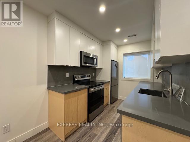 Main - 71 Chamberlain Avenue, Toronto, Ontario  M6E 4J9 - Photo 4 - W13041642