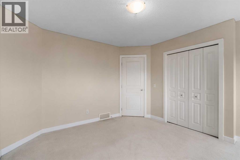 78 New Brighton Manor SE, Calgary, Alberta  T2Z 4J3 - Photo 25 - A2258105