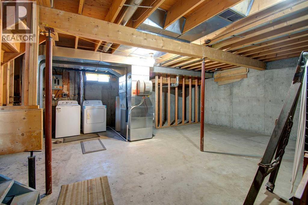 6307 Thornaby Way NW, Calgary, Alberta  T2K 5K8 - Photo 26 - A2292423