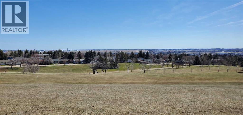 6307 Thornaby Way NW, Calgary, Alberta  T2K 5K8 - Photo 39 - A2292423
