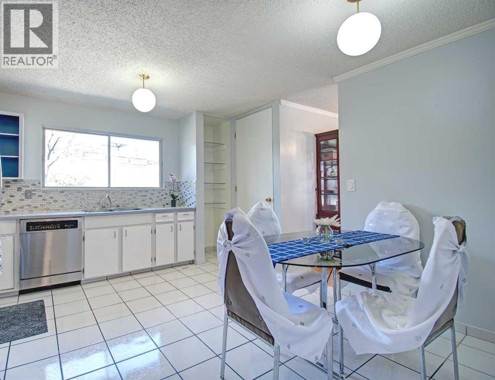 6307 Thornaby Way NW, Calgary, Alberta  T2K 5K8 - Photo 5 - A2292423