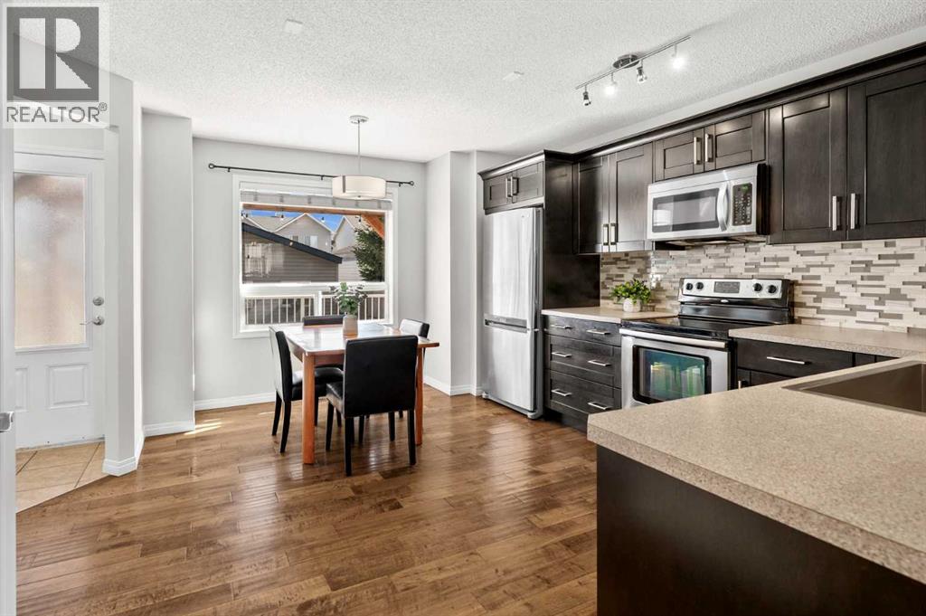 86 Elgin Meadows Gardens SE, Calgary, Alberta  T2Z 0M2 - Photo 4 - A2306573