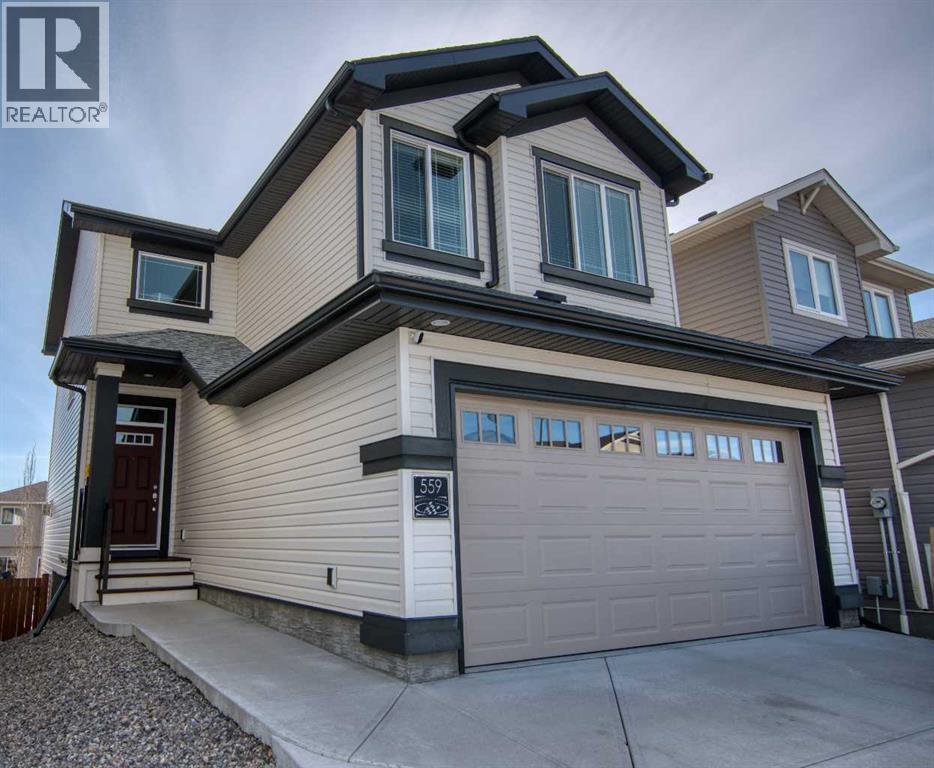 559 Moonlight Lane W, Lethbridge, Alberta  T1J 5M1 - Photo 1 - A2295389