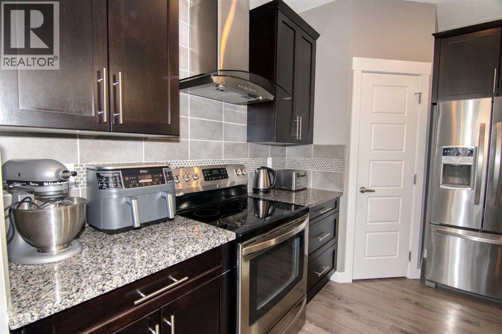 559 Moonlight Lane W, Lethbridge, Alberta  T1J 5M1 - Photo 7 - A2295389