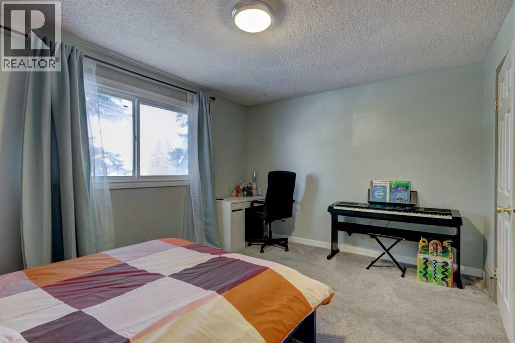 1059 Pinecliff Drive NE, Calgary, Alberta  T1W 3W8 - Photo 13 - A2293445