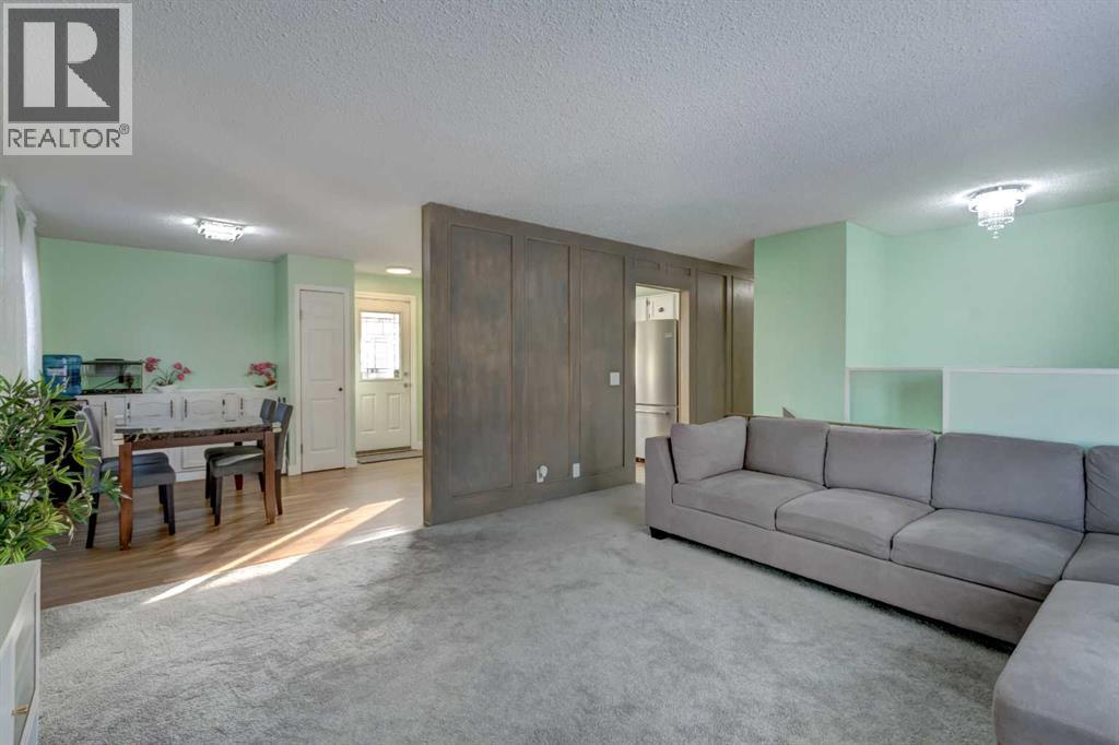 1059 Pinecliff Drive NE, Calgary, Alberta  T1W 3W8 - Photo 4 - A2293445