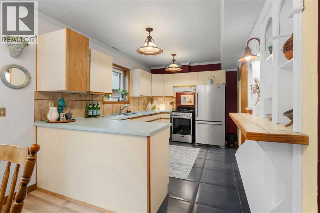 918 17 Street NW, Calgary, Alberta  T2N 2E4 - Photo 11 - A2301655
