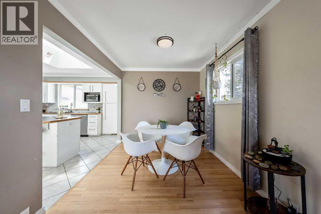 1441 Hunterbrook Road Nw, Calgary, Alberta  T2K 4V3 - Photo 9 - A2306612
