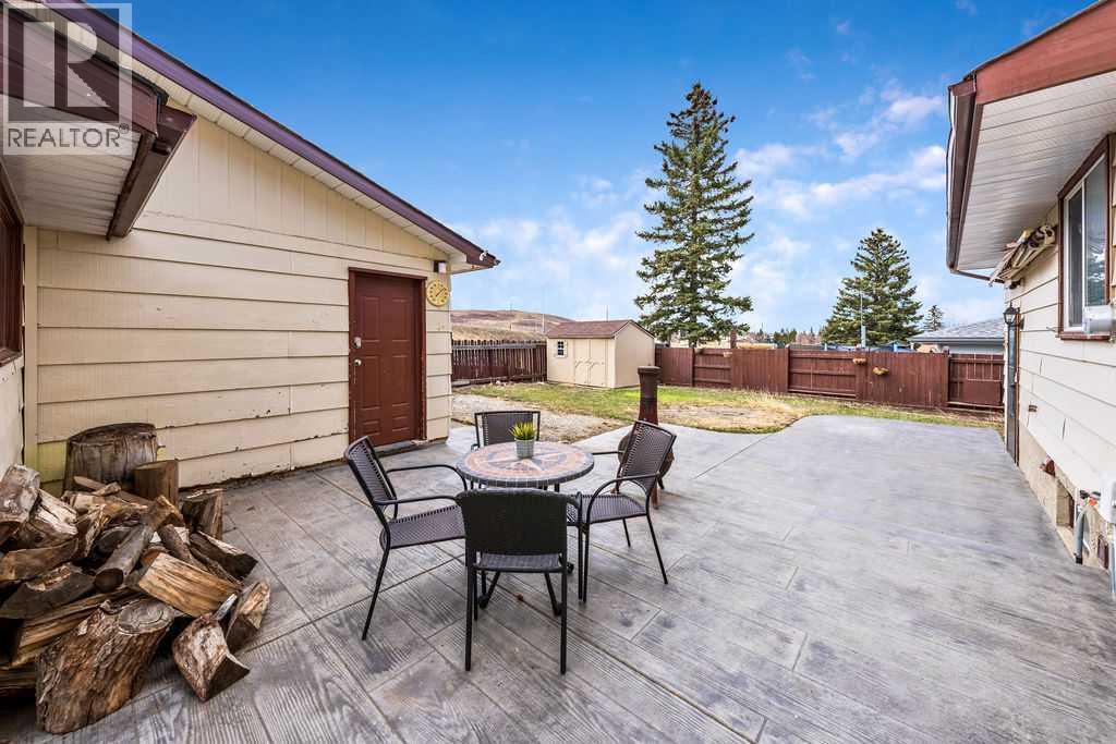 1441 Hunterbrook Road Nw, Calgary, Alberta  T2K 4V3 - Photo 33 - A2306612