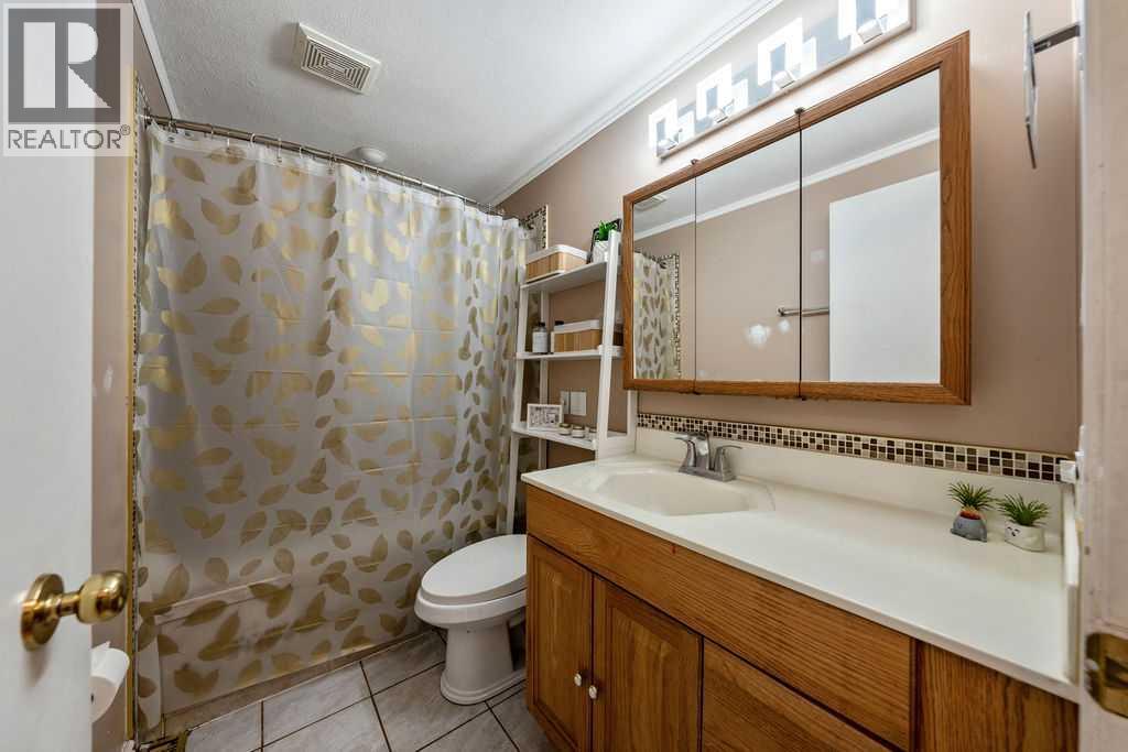 1441 Hunterbrook Road Nw, Calgary, Alberta  T2K 4V3 - Photo 21 - A2306612