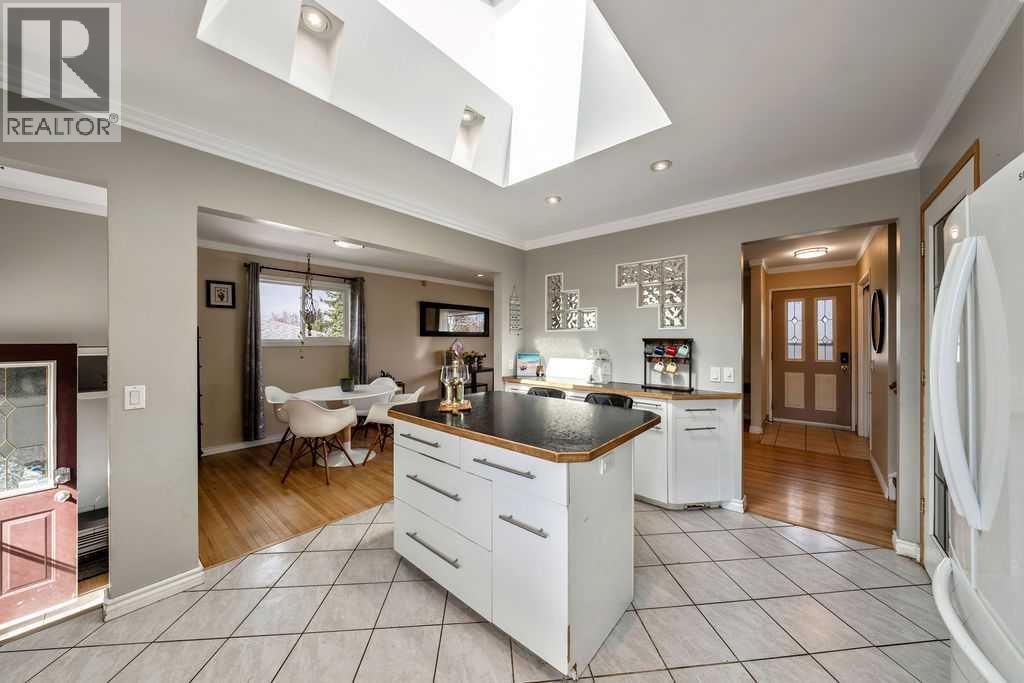 1441 Hunterbrook Road Nw, Calgary, Alberta  T2K 4V3 - Photo 15 - A2306612