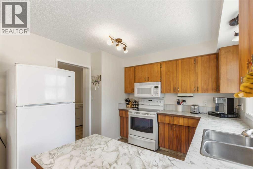 9702 119 Avenue, Grande Prairie, Alberta  T8V 3P8 - Photo 2 - A2304201