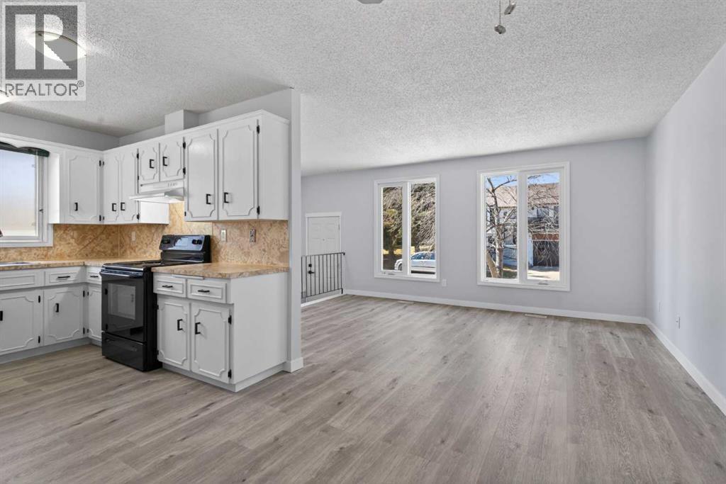 8130 13 Street NW, Calgary, Alberta  T3K 1V9 - Photo 7 - A2306195