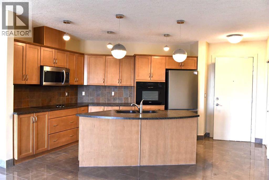 411, 3101 34 Avenue NW, Calgary, Alberta  T2L 2A3 - Photo 7 - A2304852