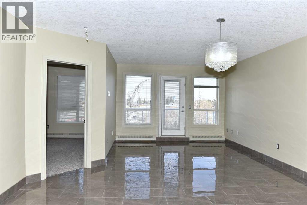 411, 3101 34 Avenue NW, Calgary, Alberta  T2L 2A3 - Photo 2 - A2304852