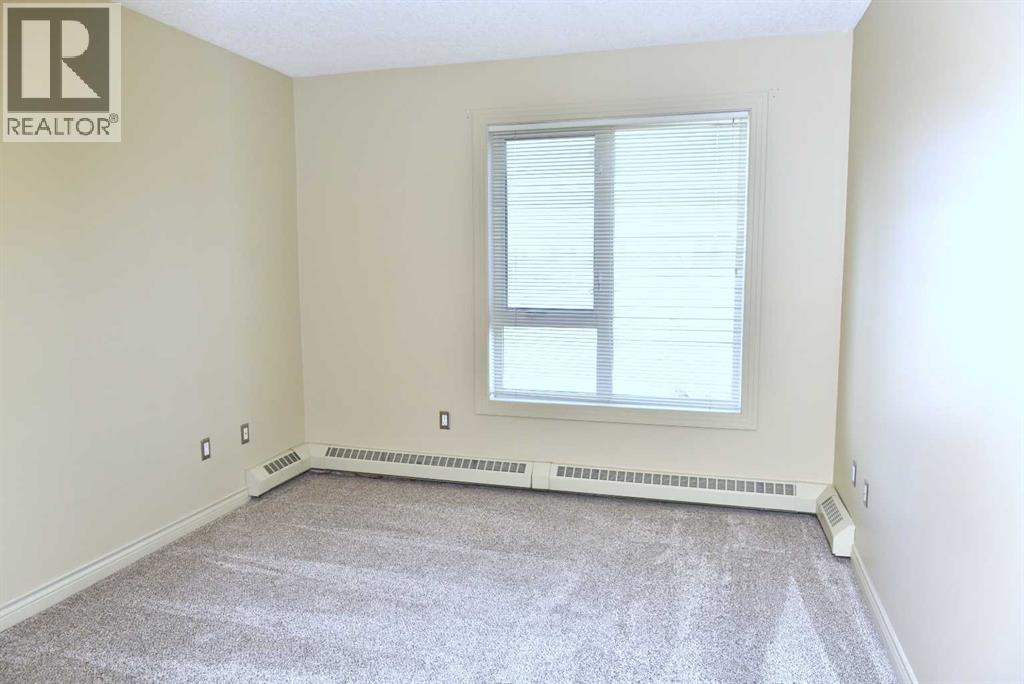 411, 3101 34 Avenue NW, Calgary, Alberta  T2L 2A3 - Photo 9 - A2304852