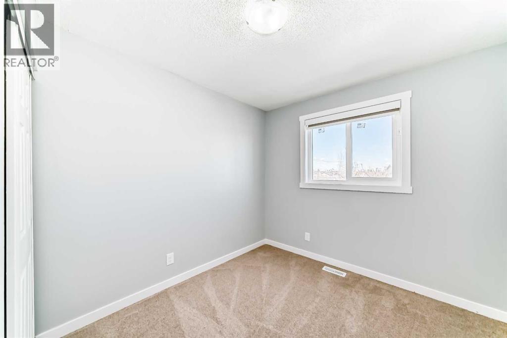 77 Martinbrook Road NE, Calgary, Alberta  T3J 3E1 - Photo 24 - A2307425