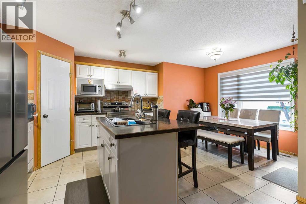 332 Harvest Hills Drive Ne, Calgary, Alberta  T3K 4H7 - Photo 9 - A2288215