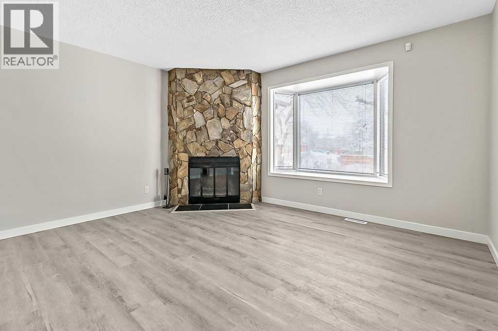 129 Berwick Drive NW, Calgary, Alberta  T3K 1E7 - Photo 5 - A2293000