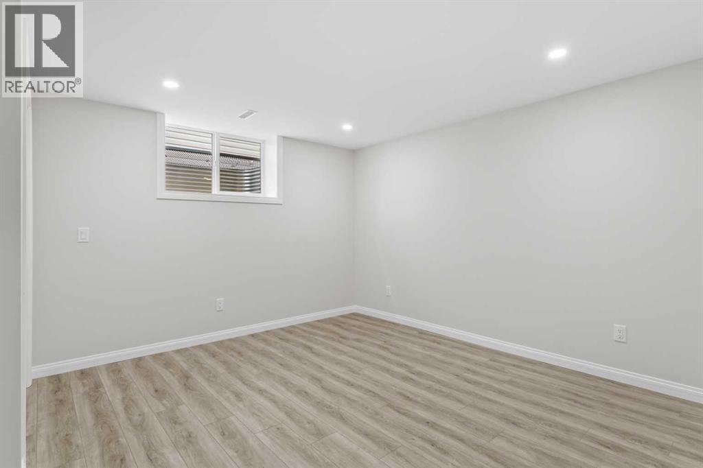 36 Woodfern Rise Sw, Calgary, Alberta  T2W 4S2 - Photo 27 - A2305683