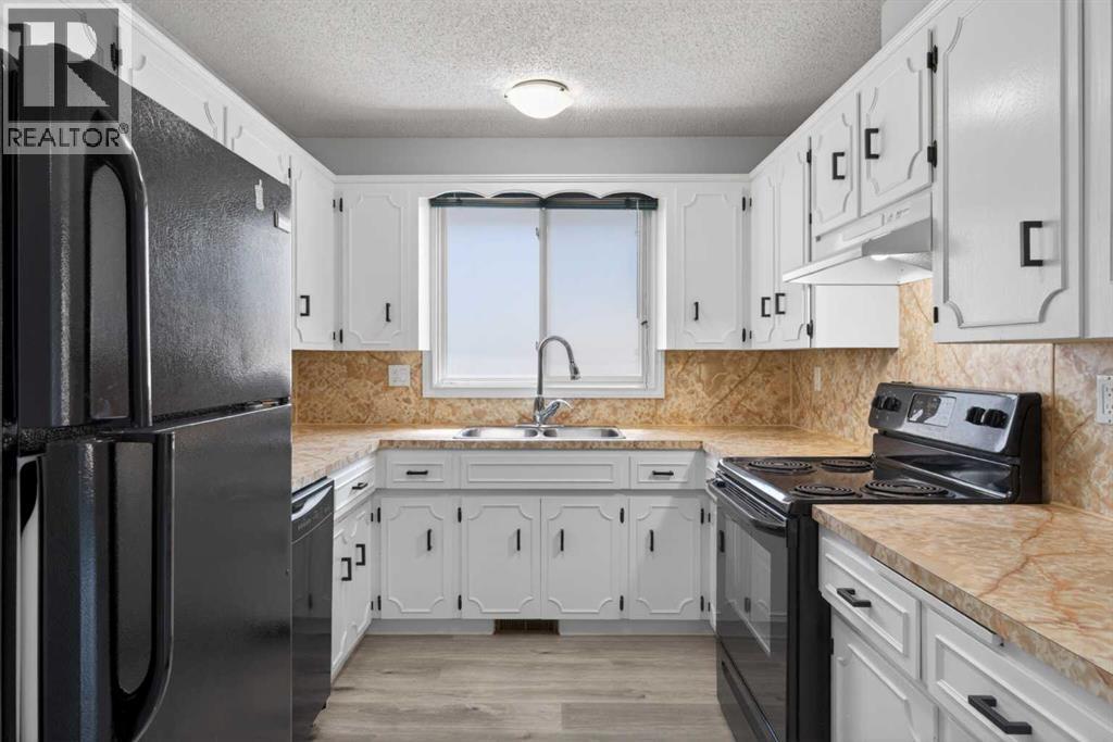 8130 13 Street NW, Calgary, Alberta  T3K 1V9 - Photo 8 - A2306195
