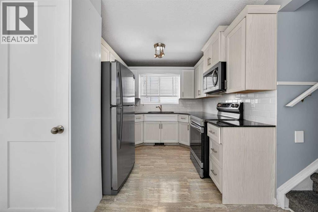84 Macewan Glen Way Nw, Calgary, Alberta  T2K 2G7 - Photo 18 - A2307010