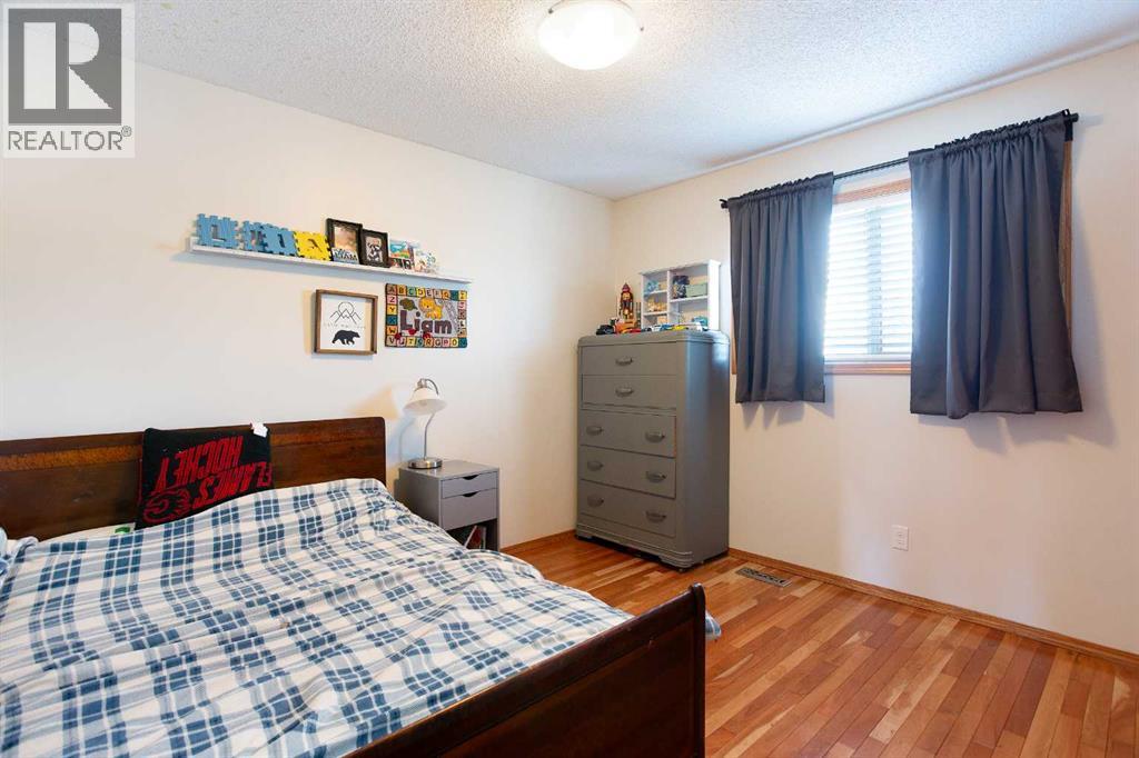 1771 Meadowbrook Drive Se, Airdrie, Alberta  T4A 2A4 - Photo 11 - A2306371