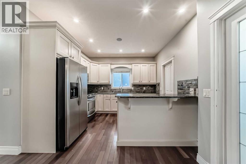 1444 40 Street SW, Calgary, Alberta  T3C 1W7 - Photo 4 - A2303492