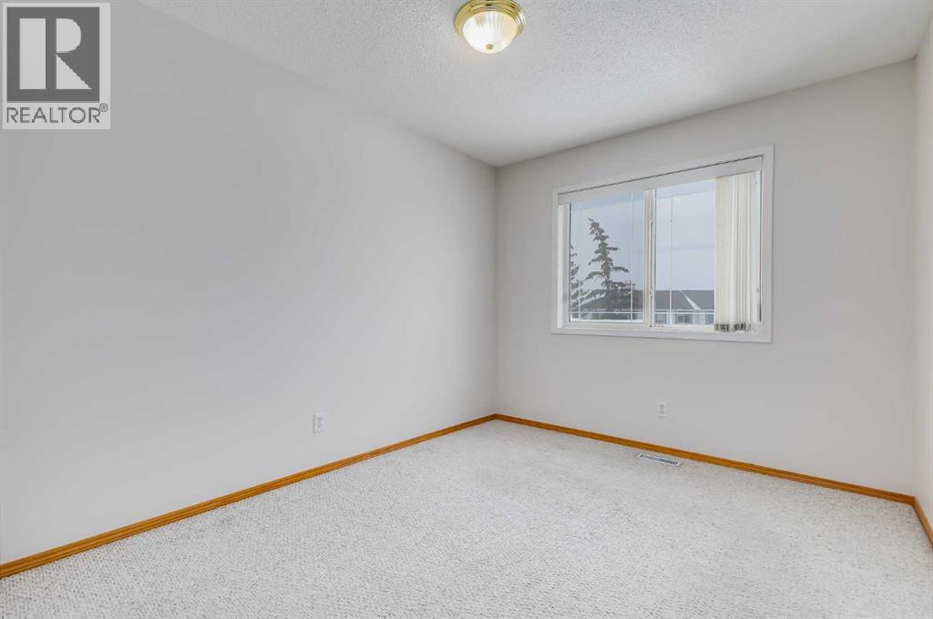 153 Rocky Ridge Court Nw, Calgary, Alberta  T3G 4S7 - Photo 21 - A2287379