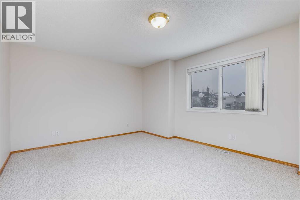 153 Rocky Ridge Court Nw, Calgary, Alberta  T3G 4S7 - Photo 18 - A2287379