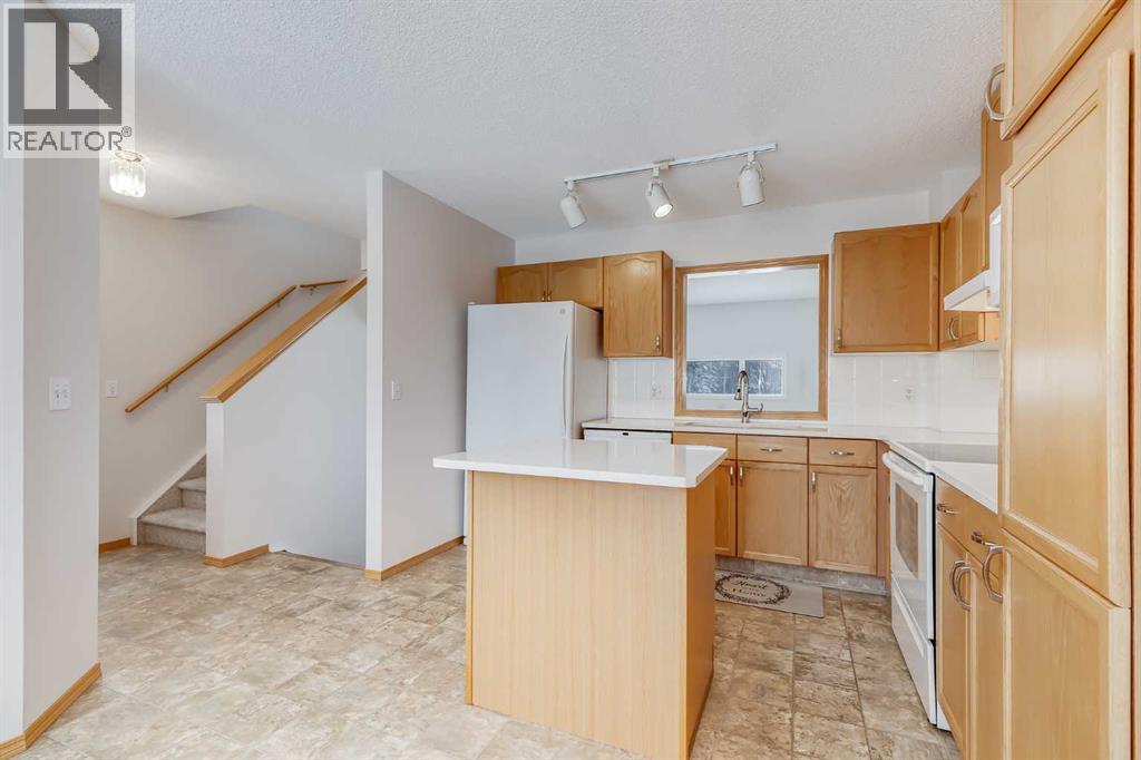 153 Rocky Ridge Court Nw, Calgary, Alberta  T3G 4S7 - Photo 14 - A2287379