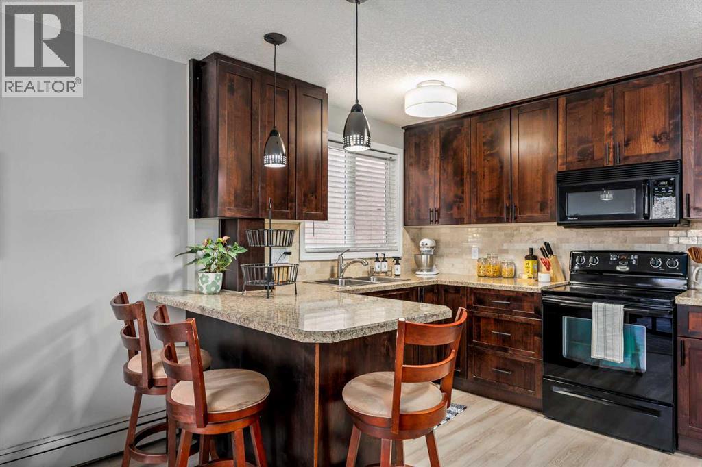 201, 828 4a Street Ne, Calgary, Alberta  T2E 3W4 - Photo 10 - A2307450