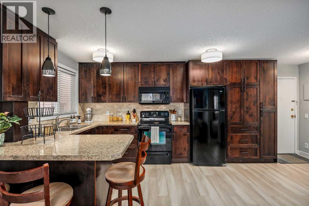 201, 828 4a Street Ne, Calgary, Alberta  T2E 3W4 - Photo 9 - A2307450