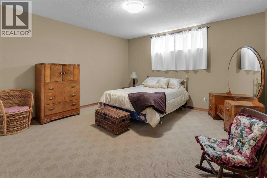 222 Ross Avenue, Cochrane, Alberta  T4C 1Z3 - Photo 35 - A2293461