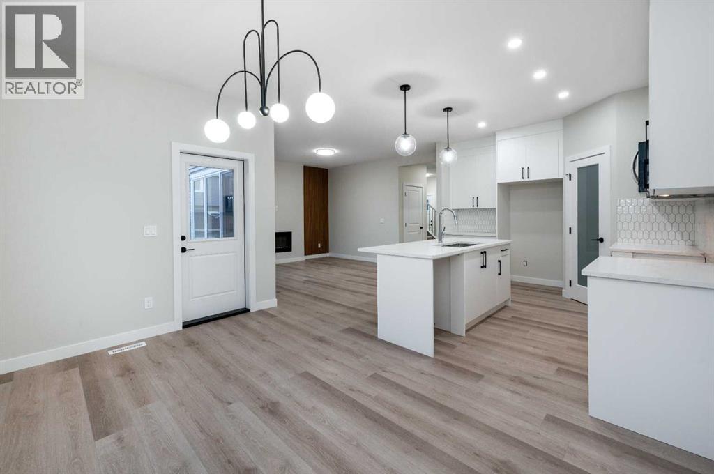 84 Waterford Manor, Chestermere, Alberta  T1X 2T9 - Photo 8 - A2302935