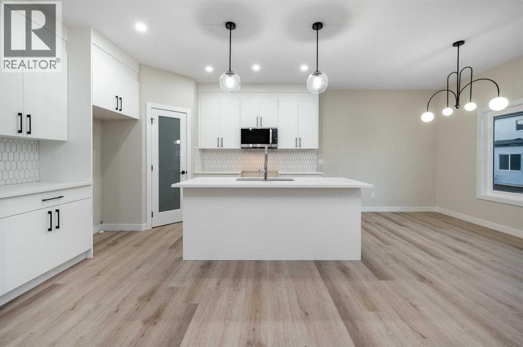 84 Waterford Manor, Chestermere, Alberta  T1X 2T9 - Photo 5 - A2302935
